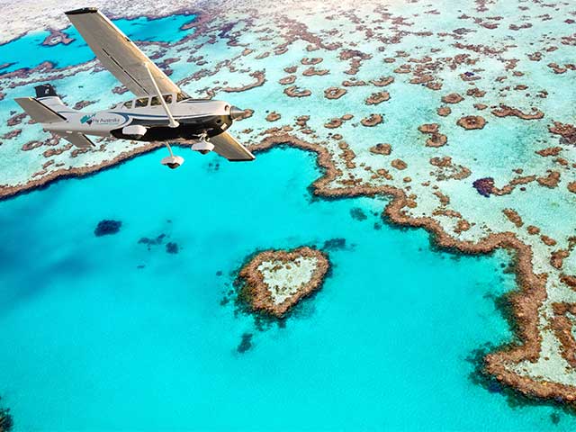 secen fligh over great barrier reef and whitehaven beach