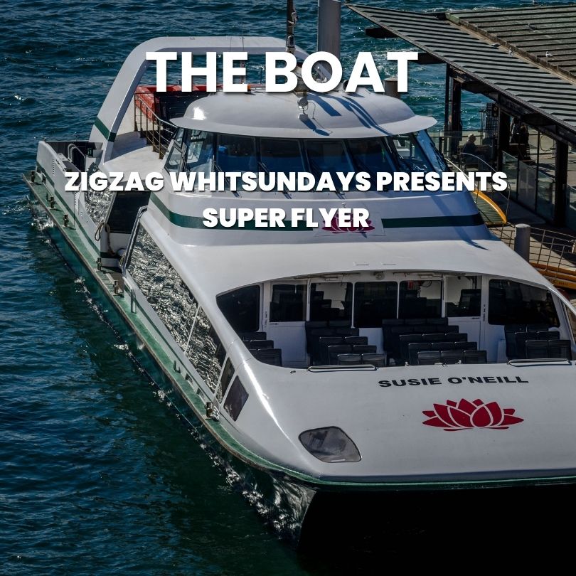 Zigzag whitsundays boat passing whitehaven beach