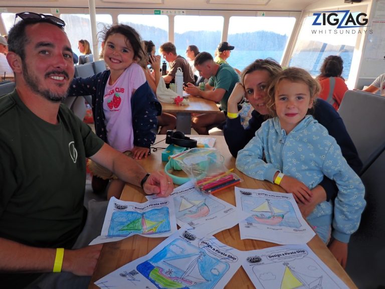 Travelling with children on zigzag whitsundays (13) (medium) Family using the colouring in sets onboard zigzag whitsundays