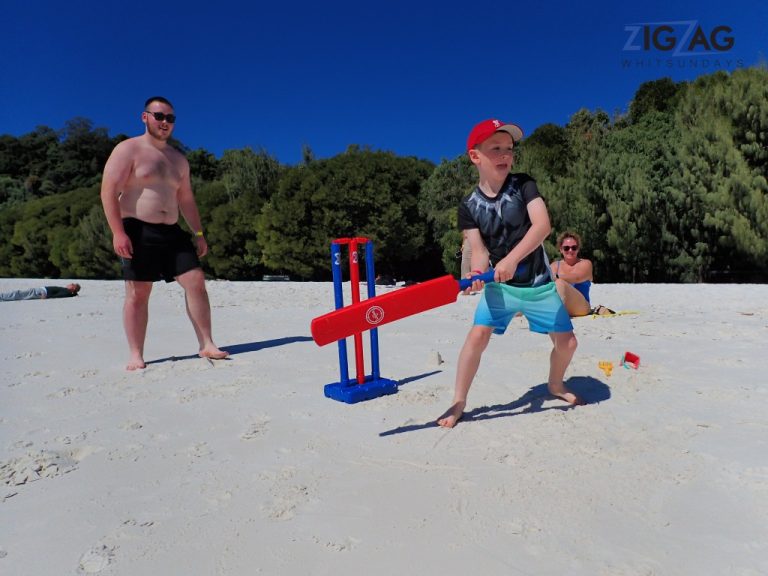 Travelling with children on zigzag whitsundays (15) (medium) Playing beach cricket at whitehaven beach
