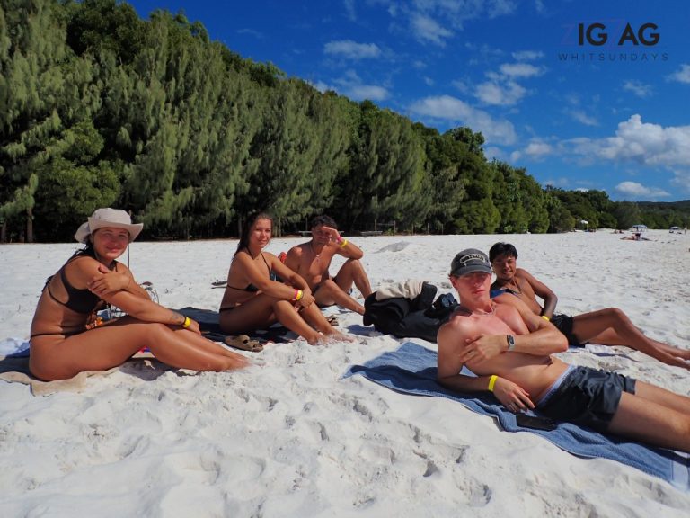 5 friends on zigzag whitsundays day tour enjoying beach time